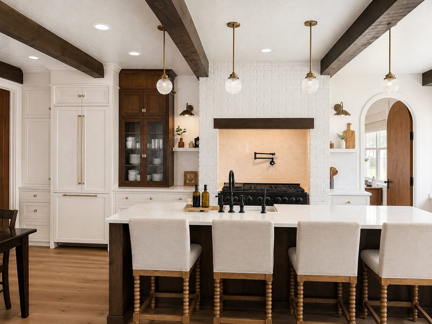 Custom remodeled kitchen with exposed wood beams and brass fixtures built by Big Rig Construction in Sanpete County, Utah